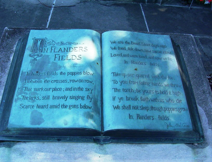 A tribute to the poen "In Flanders Fields" in the memorial park and cenotaph beside the McCrae House Museum (Photo Credit: Laura Waldie, 2011)